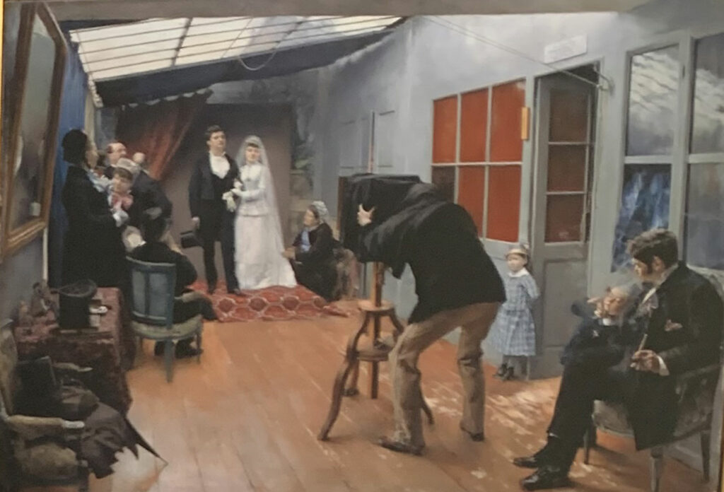 représentation peinture d'un studio photo début 20ème siècle les début du métier de photographe